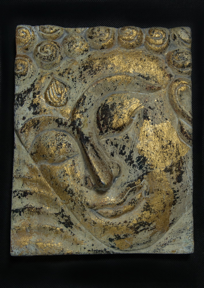 Plastický obraz Buddhovy tváře, světlý